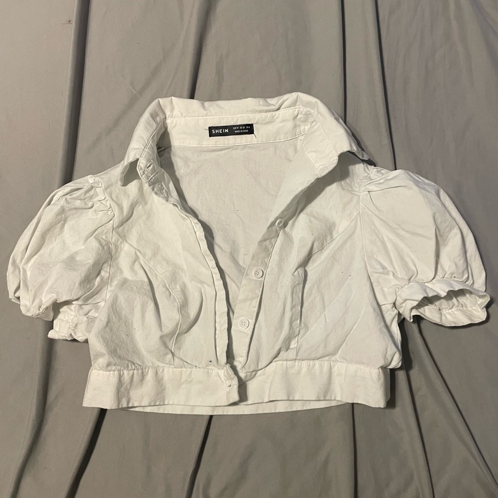 It’s a crop top and a button up